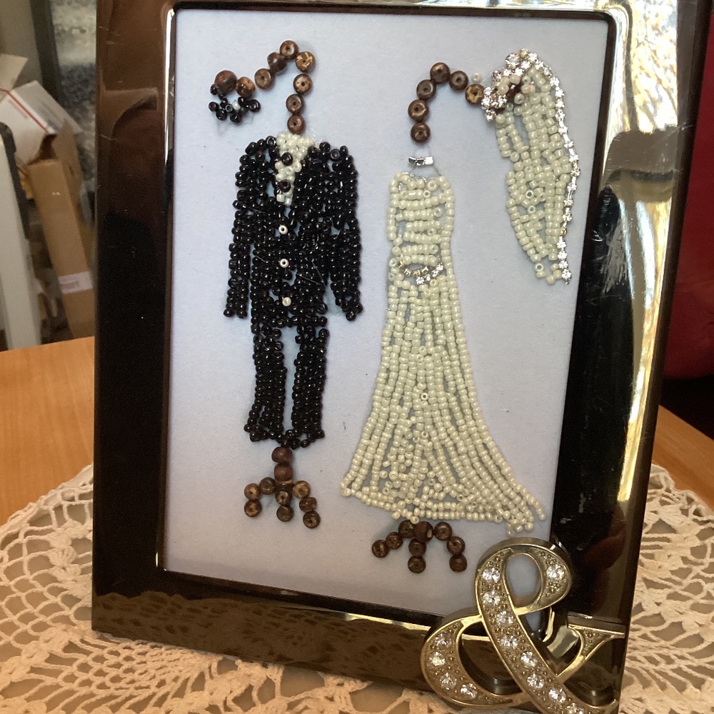 Handcrafted bride groom dress and tux stands black white marriage beads jewelry